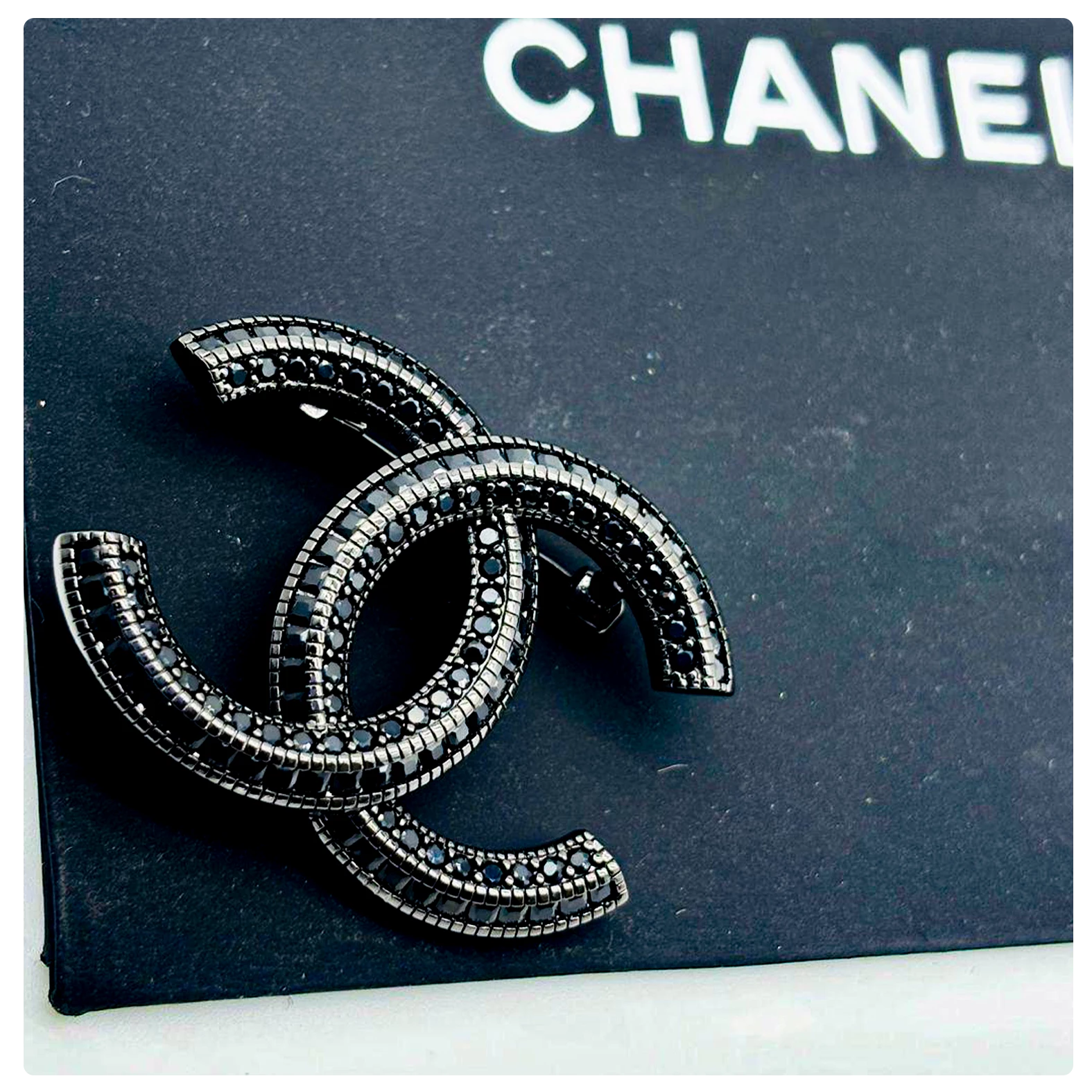 Chanel Black Crystal Logo Brooch